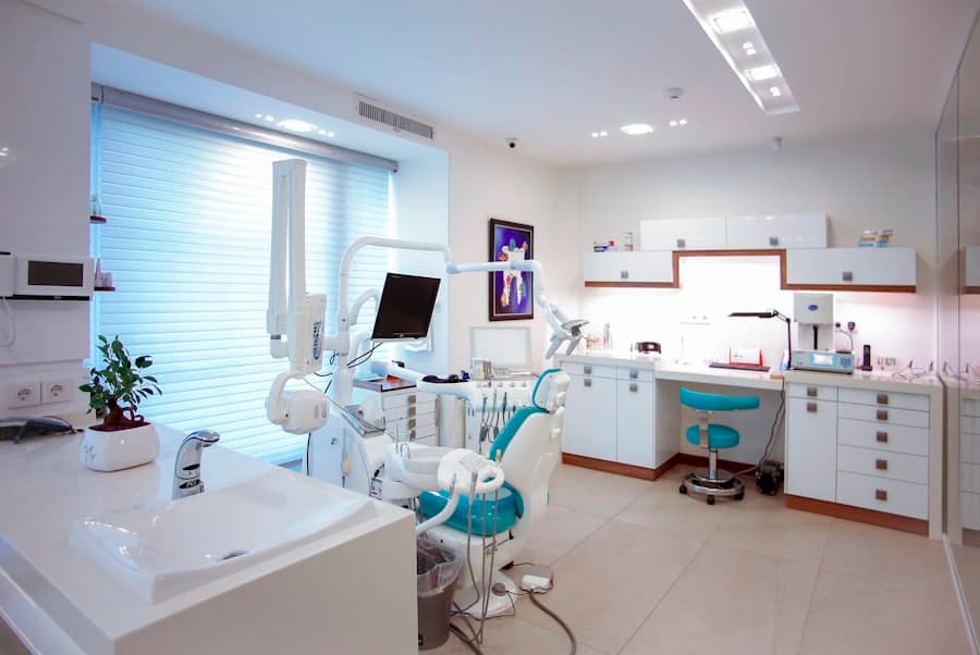 Modern dental practice interior with treatment chair and equipment
