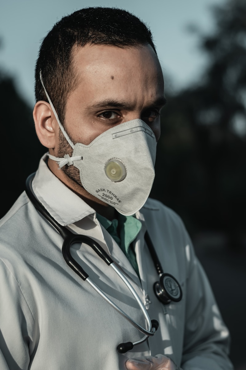 Physician wearing credential badges in modern clinic setting